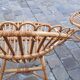 Pairs of shell rattan armchairs from the 50