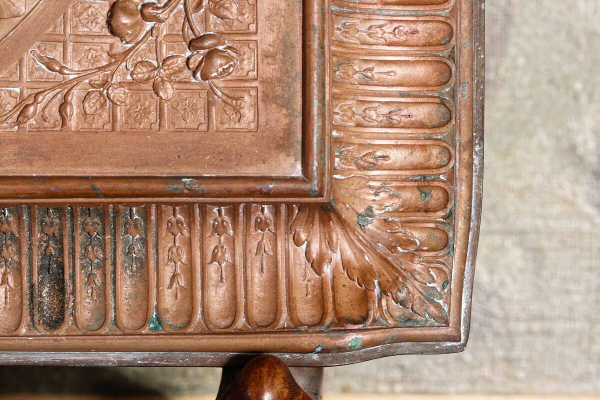 Repoussé copper plaque, early 19th century, in Neoclassical style.