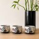 Three glazed ceramic bowls with raised graphic decoration, 1970s.