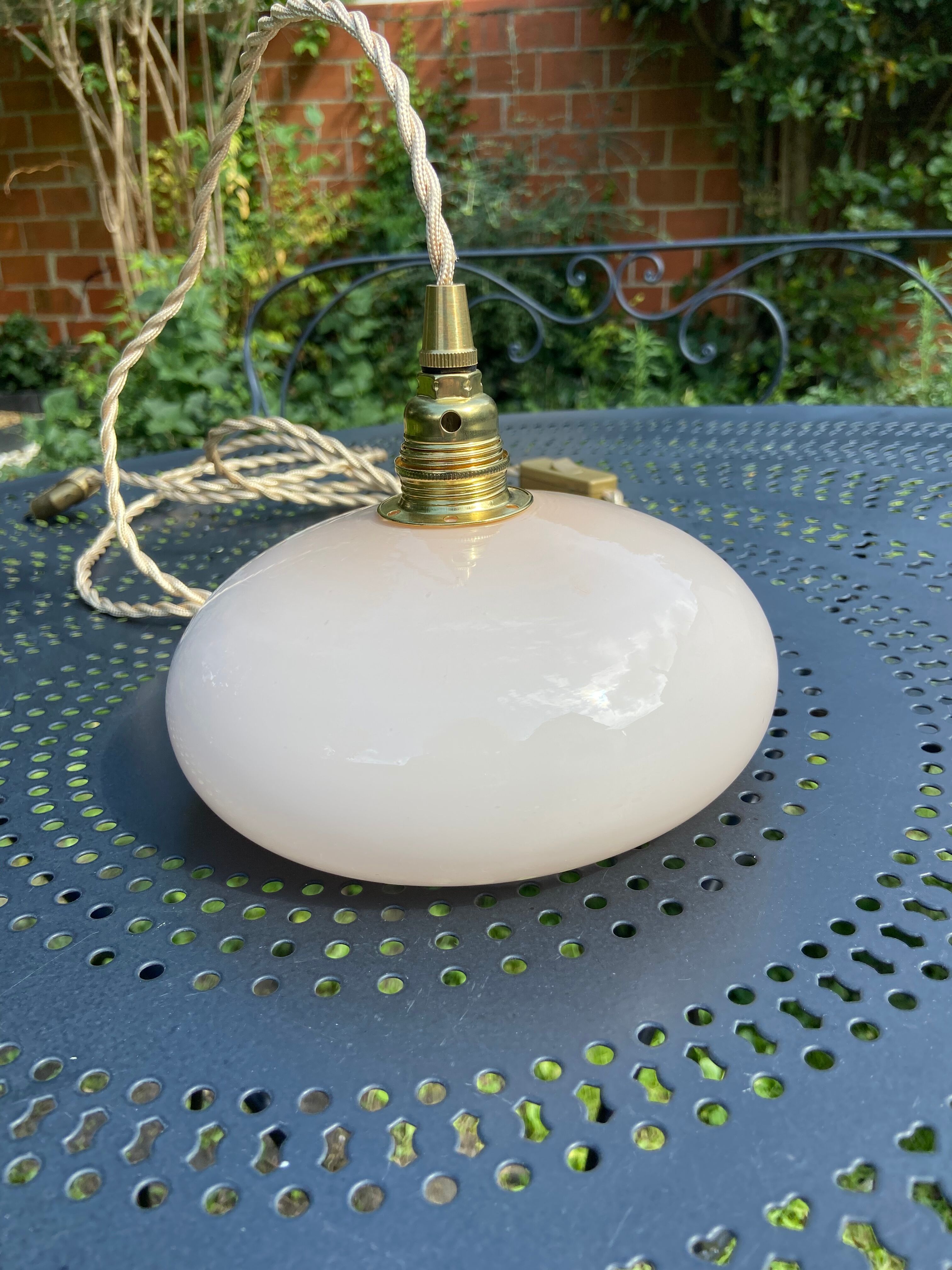 Vintage powder pink opaline globe player 1950