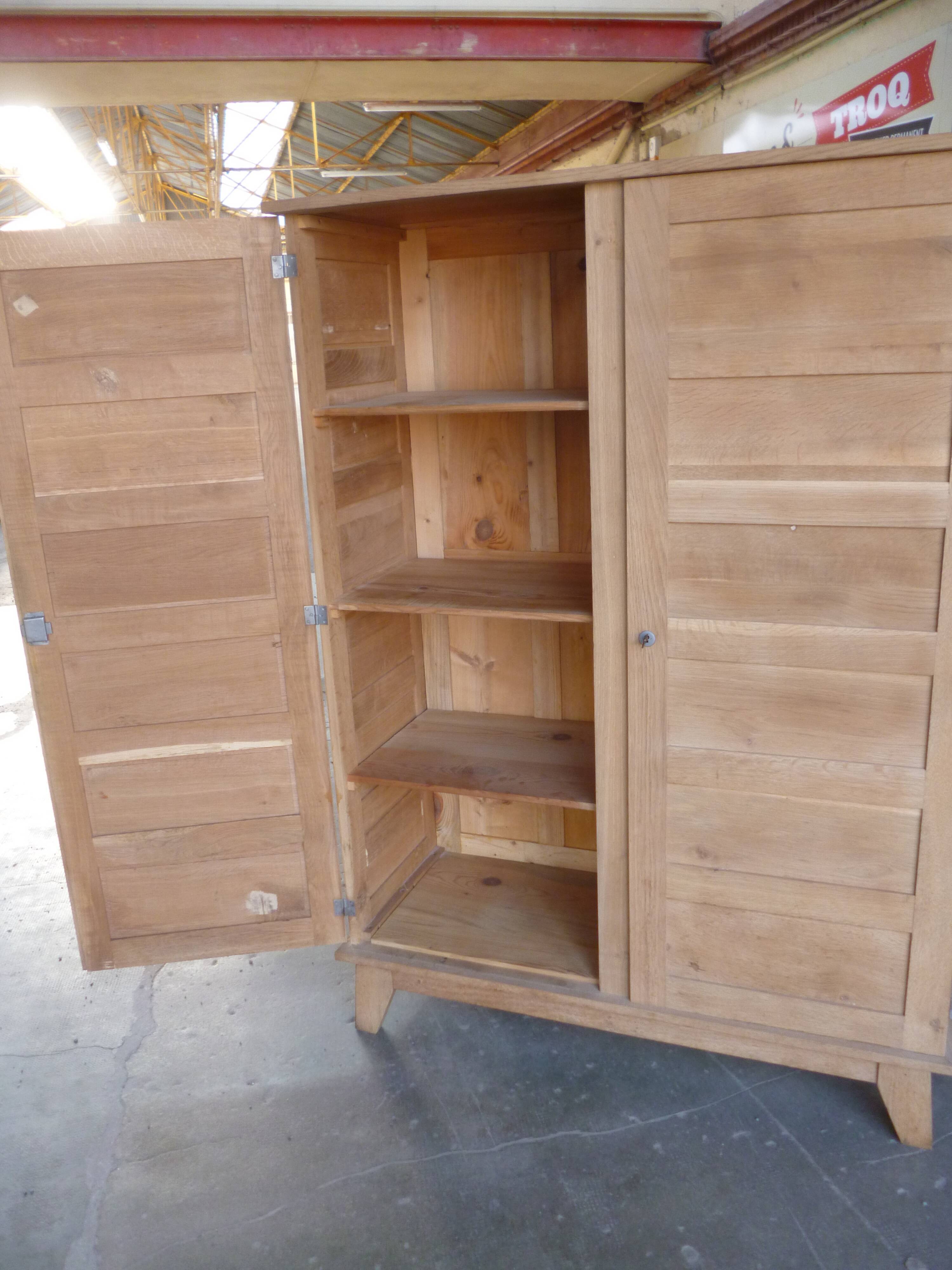 Oak cabinet by René Gabriel