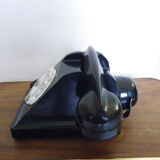 Black bakelite phone with earphone