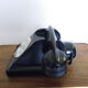 Black bakelite phone with earphone