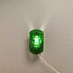 Old wall lamp made of hard pressed green glass.