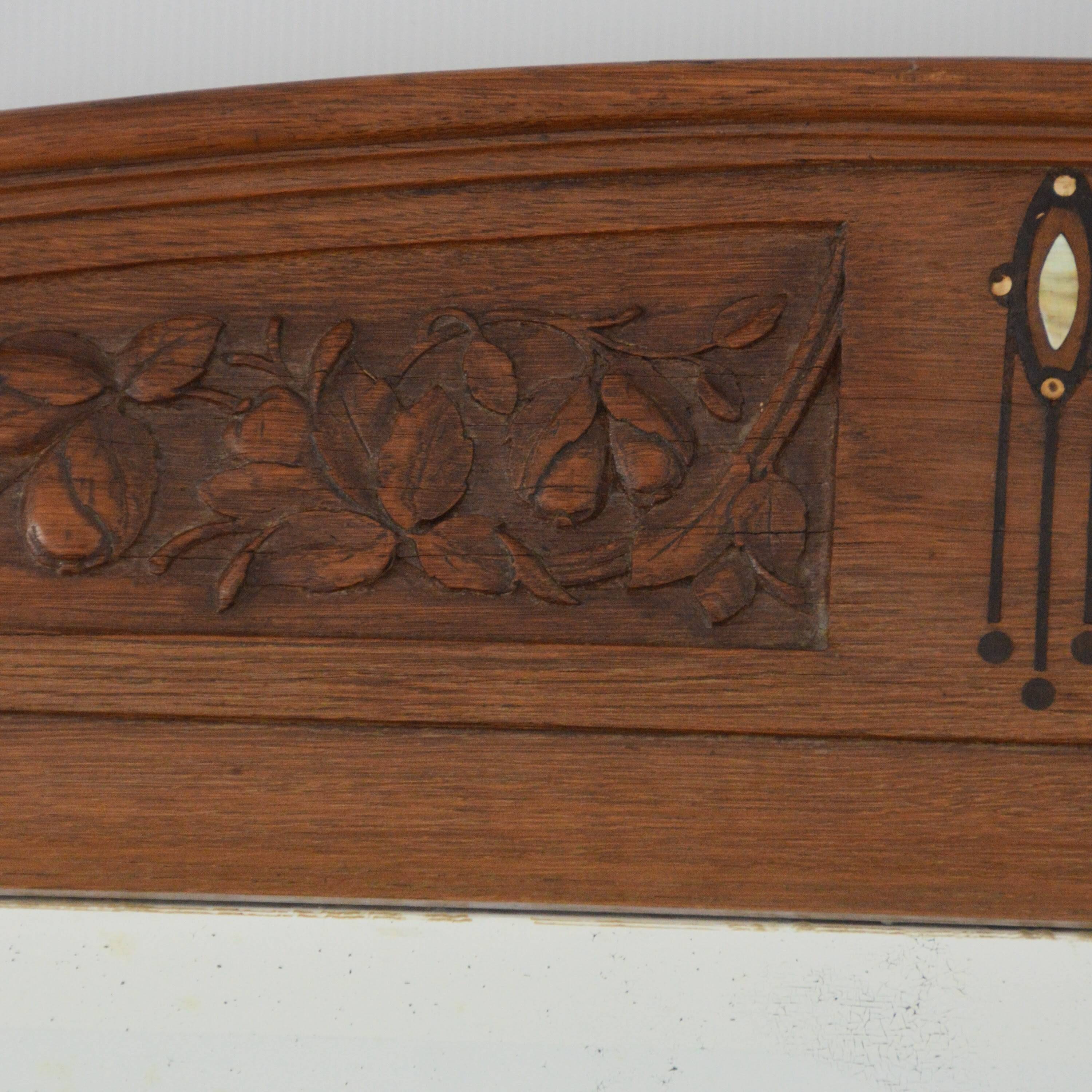 Bevelled Art Nouveau mirror in oak, vintage 1920.
