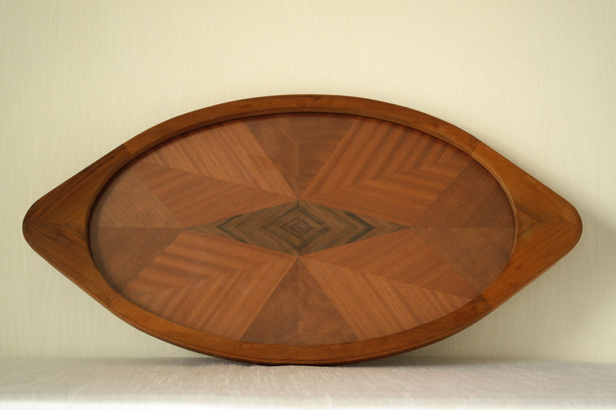 Oval wooden tray with glass and artisanal marquetry from the 70s.