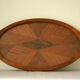 Oval wooden tray with glass and artisanal marquetry from the 70s.