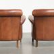 Set of 2 comfortable sheepskin armchairs with a timeless look