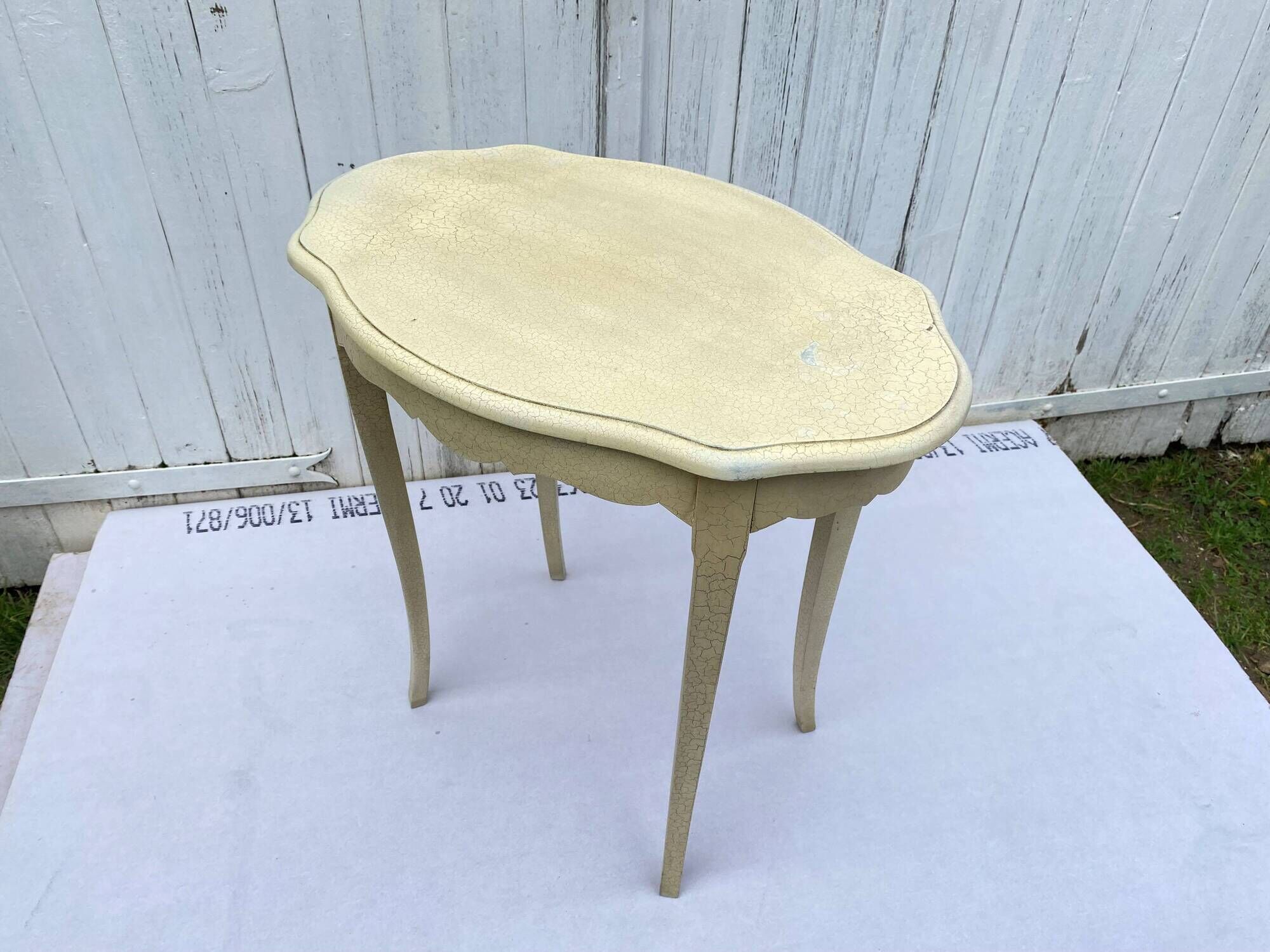 Eggshell-coloured drawer with a cracked effect side table.