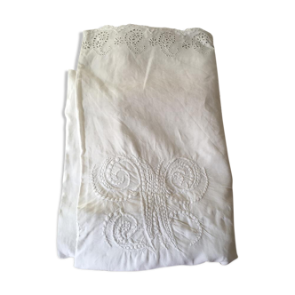 Old sheet in linen embroidered Monogram V M thread.