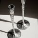 Pair of aluminium candle holders