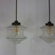 Set of two glass pendant lighting designed by Raak Holland
