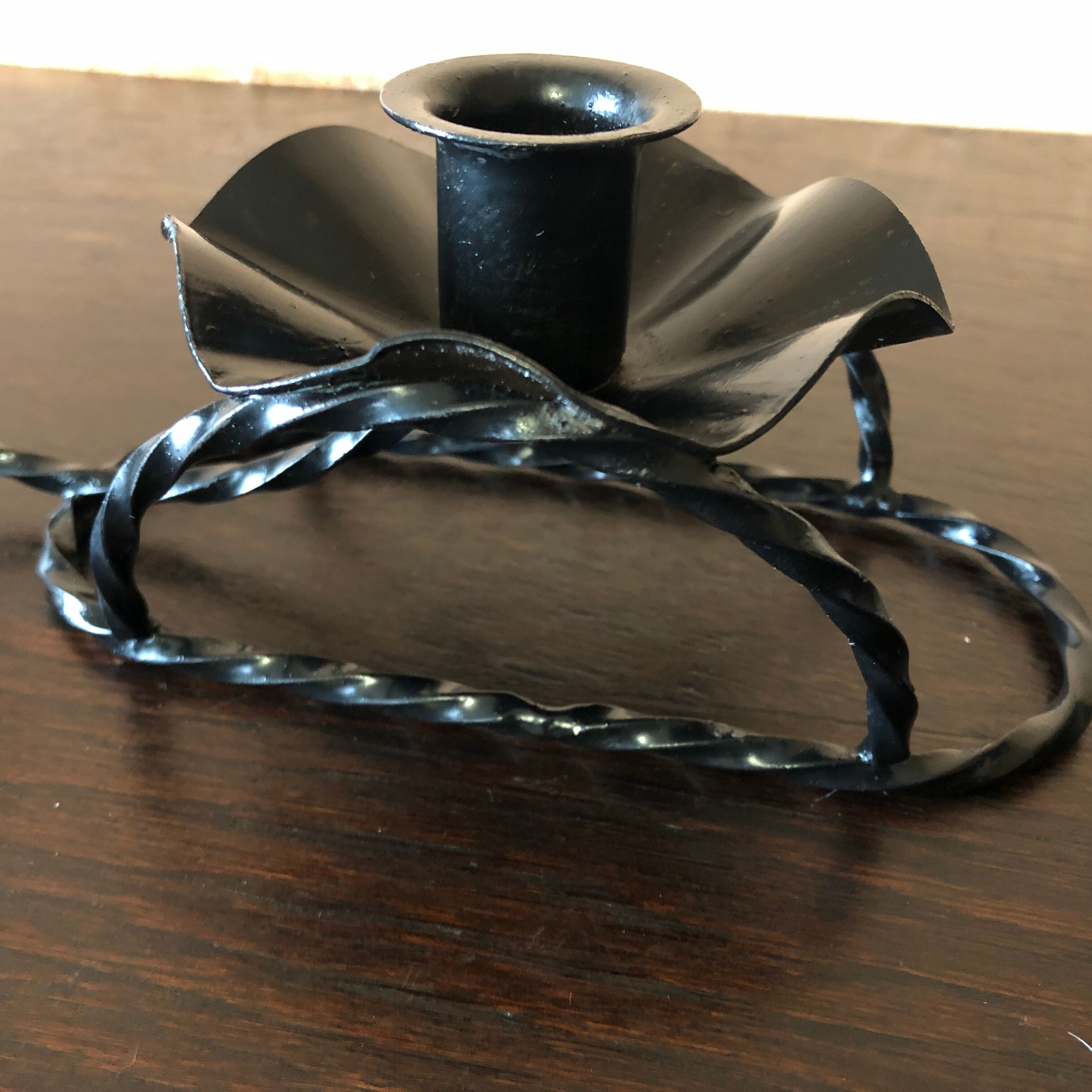 Handmade hand candle holder in vintage black wrought iron