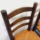 Set of 4 vintage brutalist chairs by Georges Robert in wood and straw.