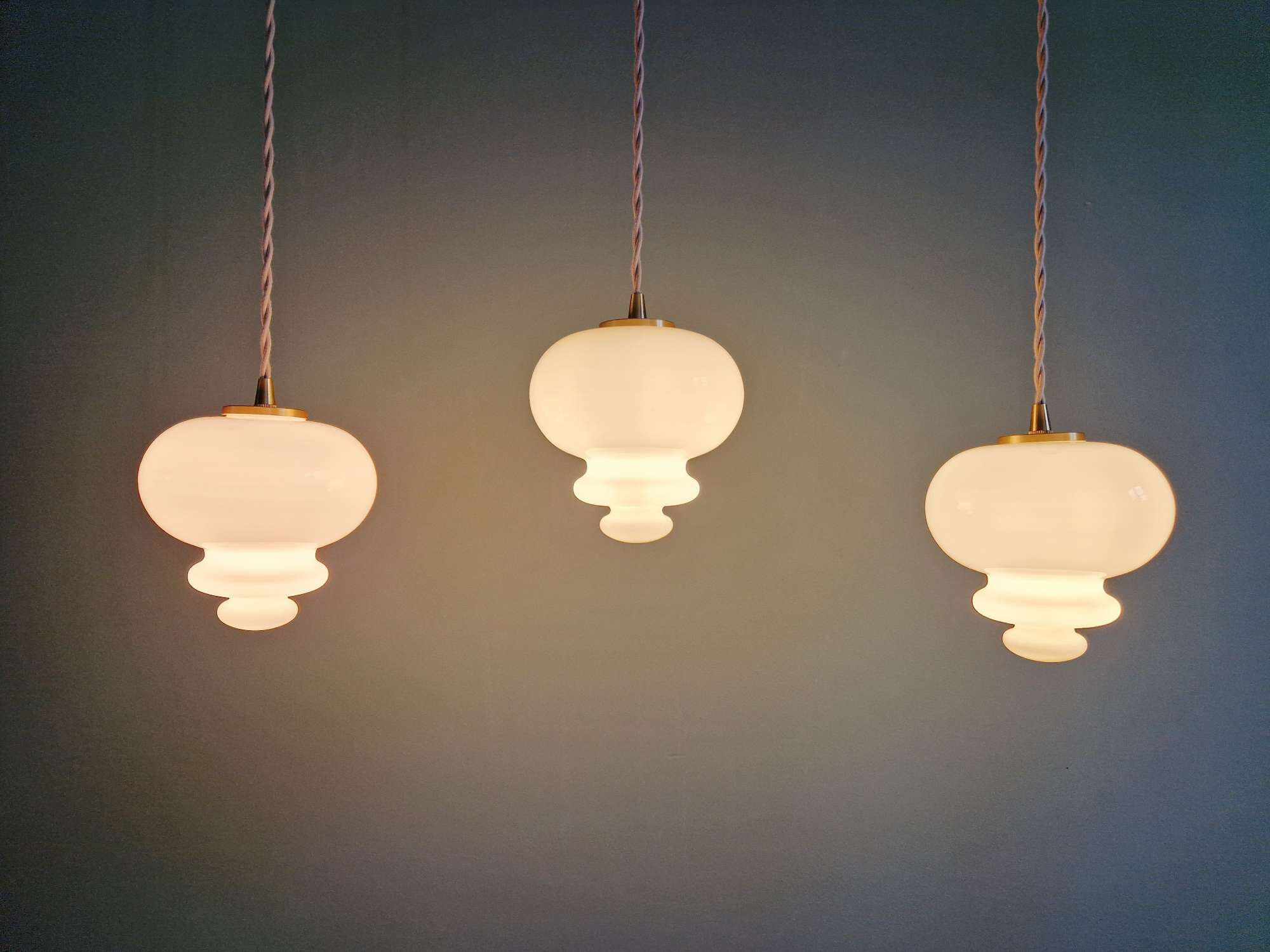 Scandinavian trio of suspensions in white opaline, 1960s