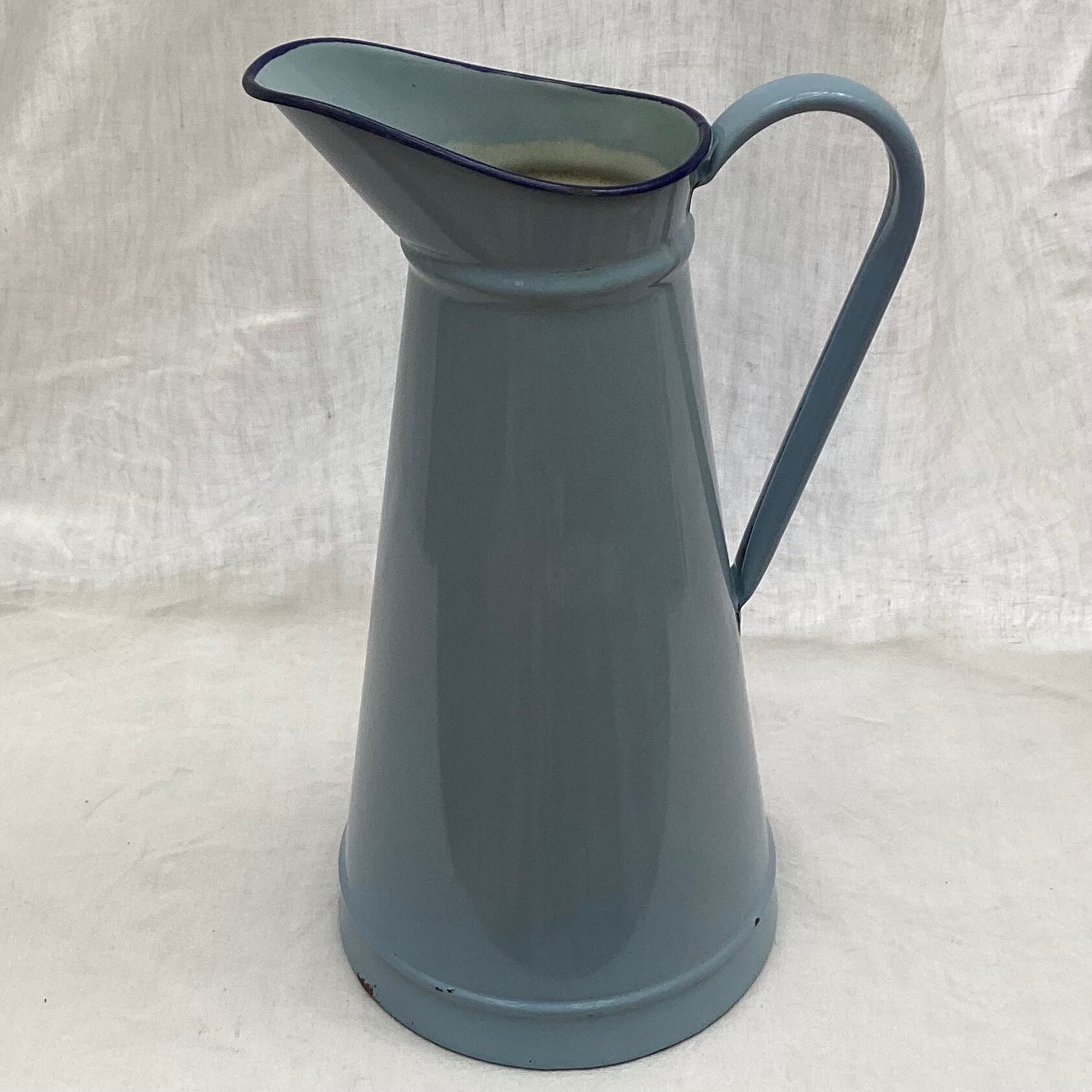 Old broc in enamelled sheet metal light blue color