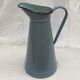 Old broc in enamelled sheet metal light blue color