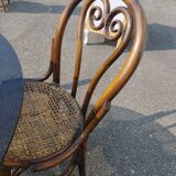 Rattan dining table and its 4 matching chairs