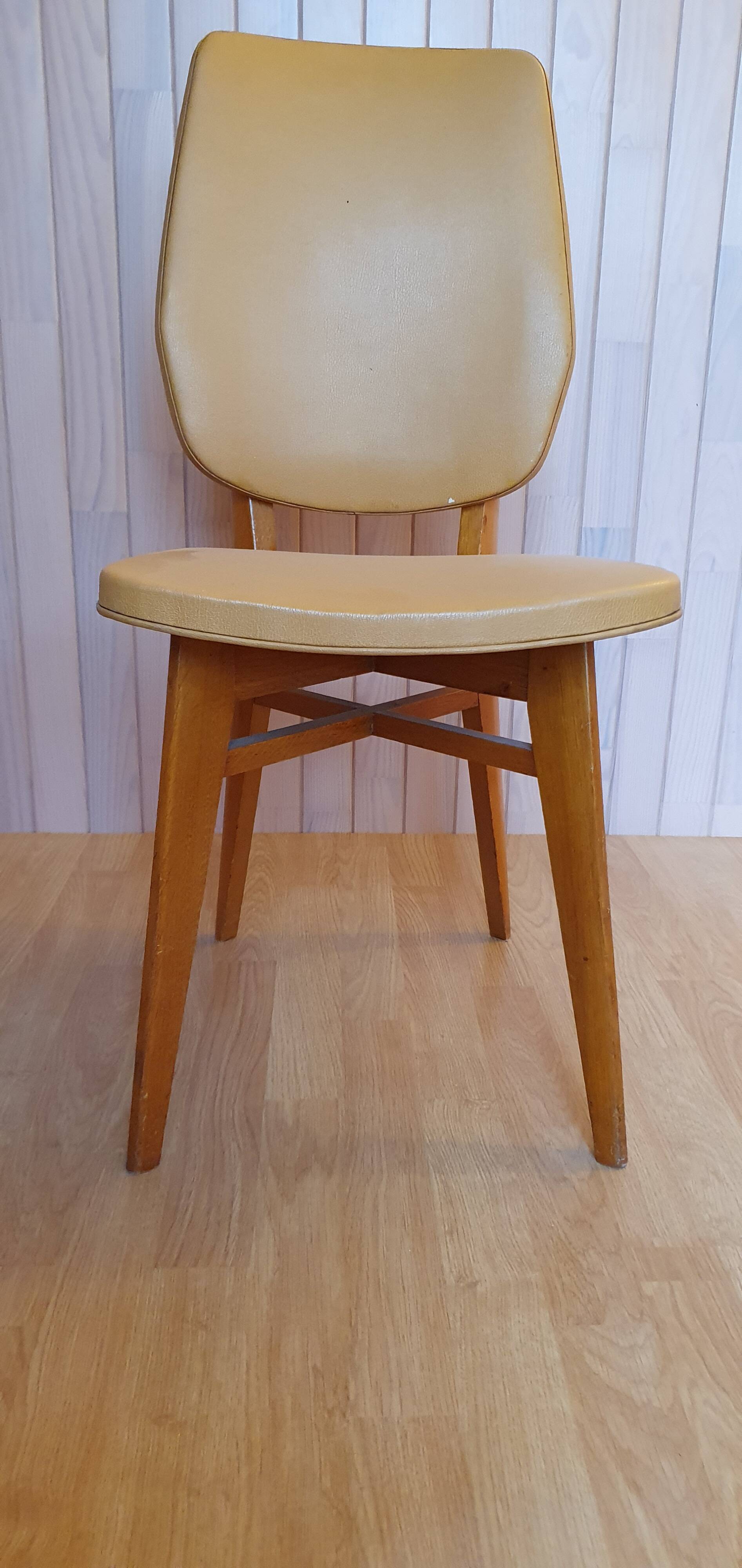 Scandinavian skai chairs with wooden splayed legs from the 1960s.