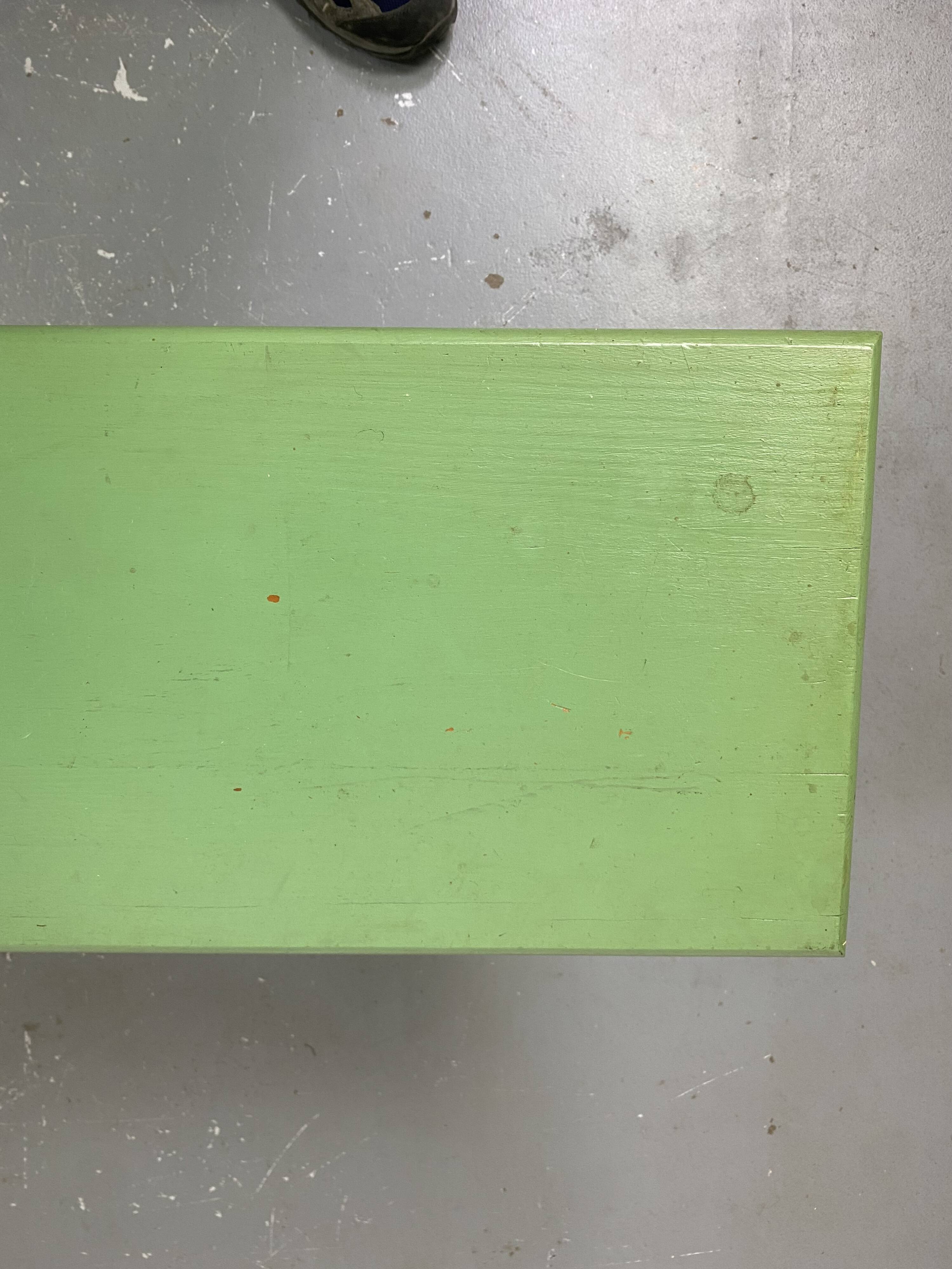 Green wooden bench