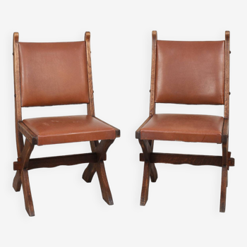 Pair of brutalist style chairs, in wood and leather.