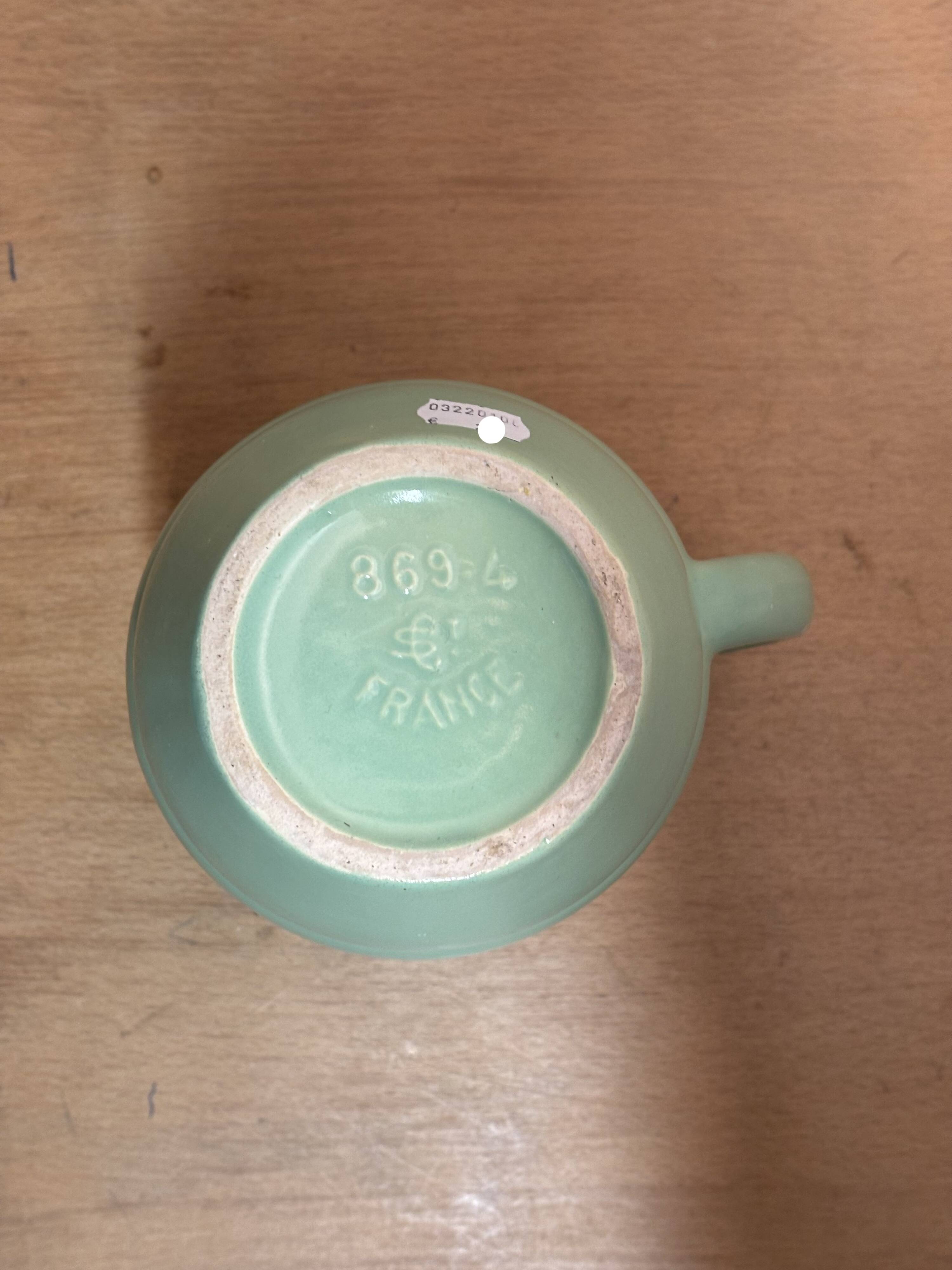 Green earthenware pitcher