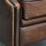 Sheepskin wingback armchair with beautiful colours in good condition