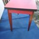 Table in red formica