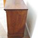 Commode 4 tiroirs en bois massif, début XXème s.