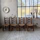 Set of 4 oak and straw chairs Dudouyt 1940