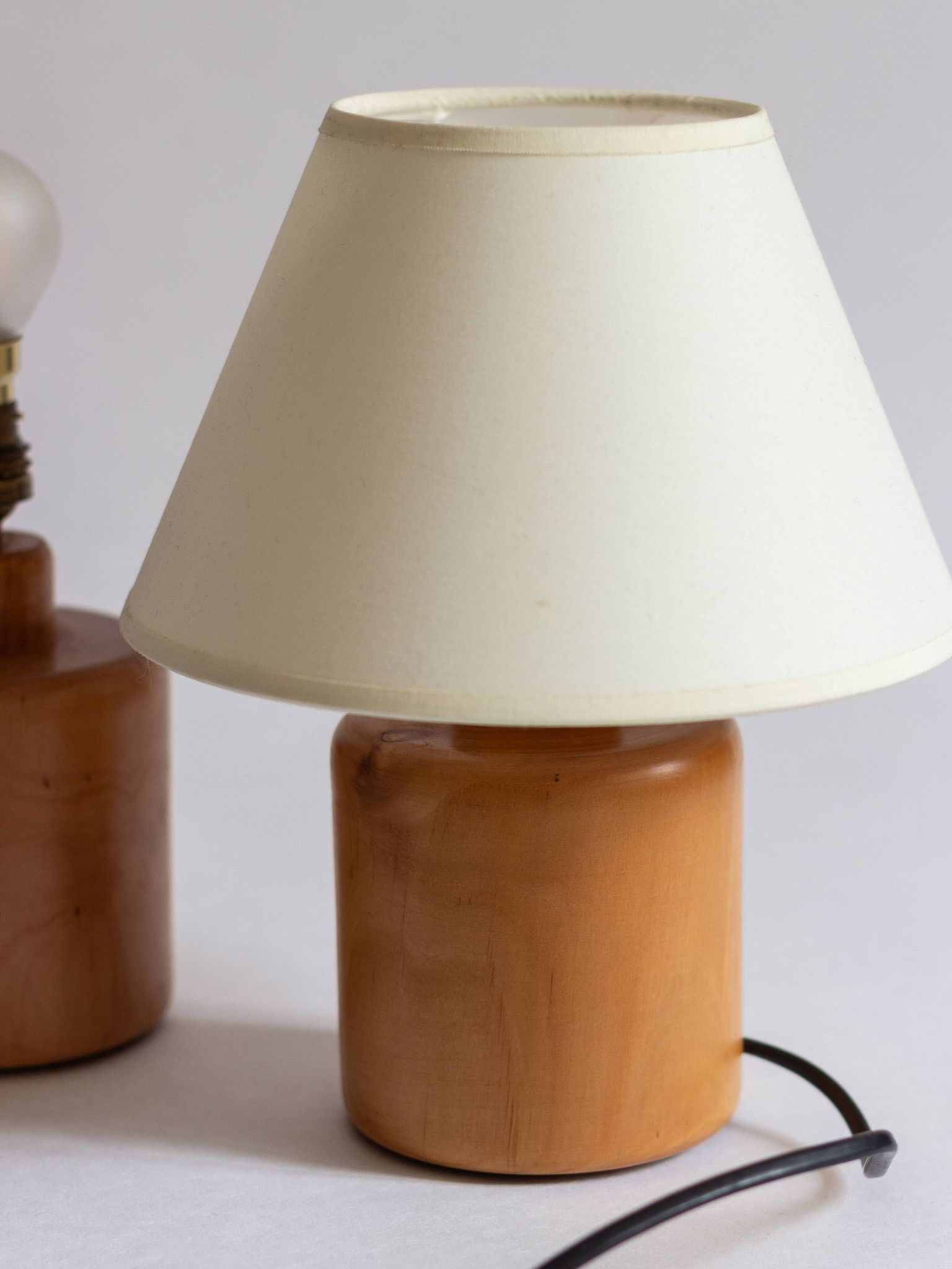 Pair of light wood table or bedside lamp bases, 1970s