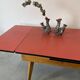 Table à rallonges en Formica et pieds bois