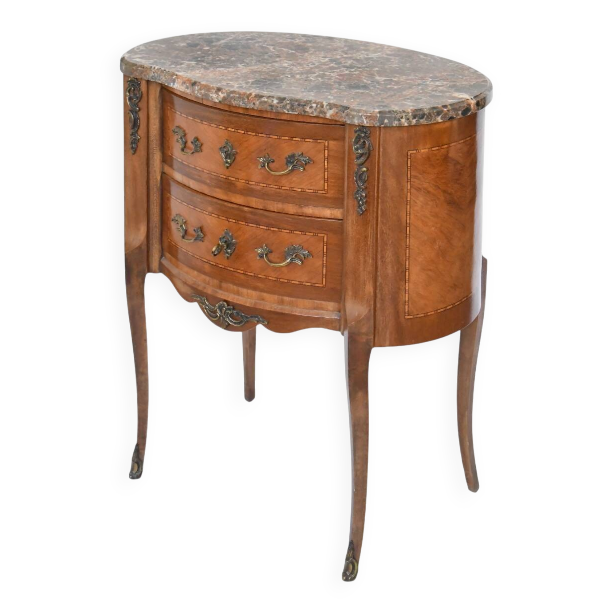 Small kidney-shaped chest of drawers in Transition style.