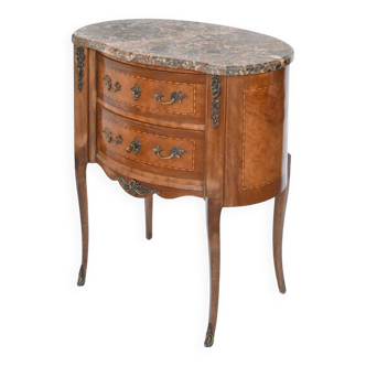 Small kidney-shaped chest of drawers in Transition style.