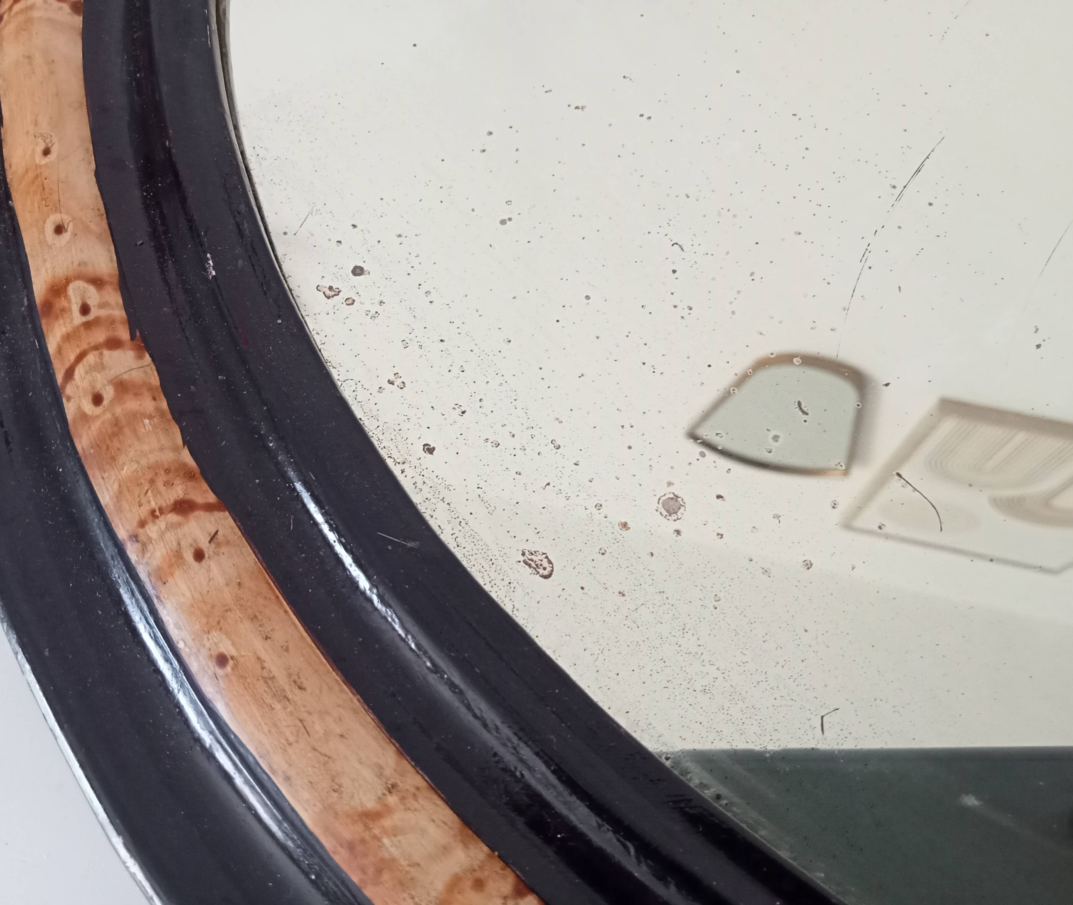 19th-century antique mirror in wood and stucco.