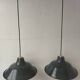 Pair of enamelled sheet metal suspensions
