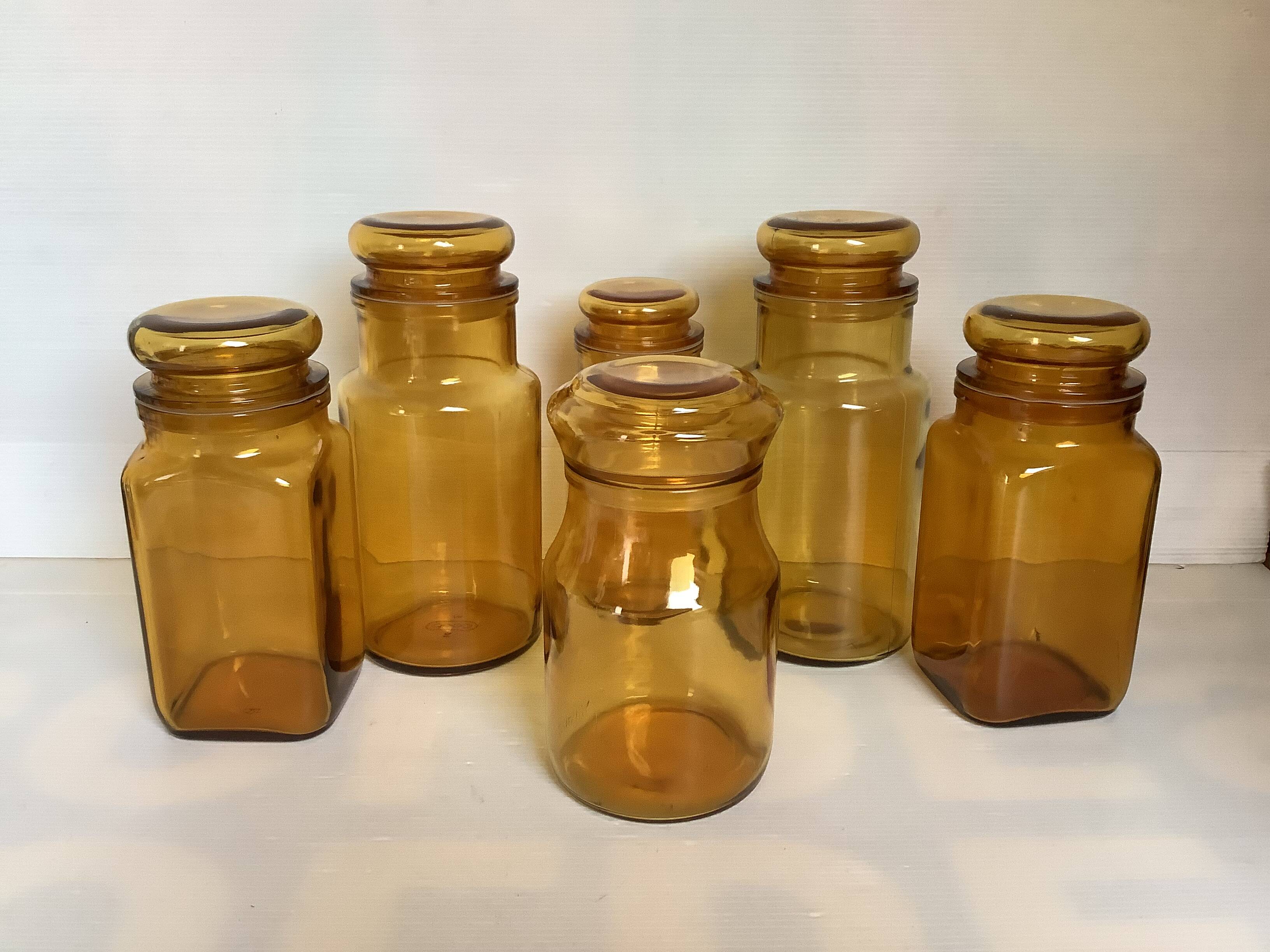 Six yellow glass candy jars from the 70s