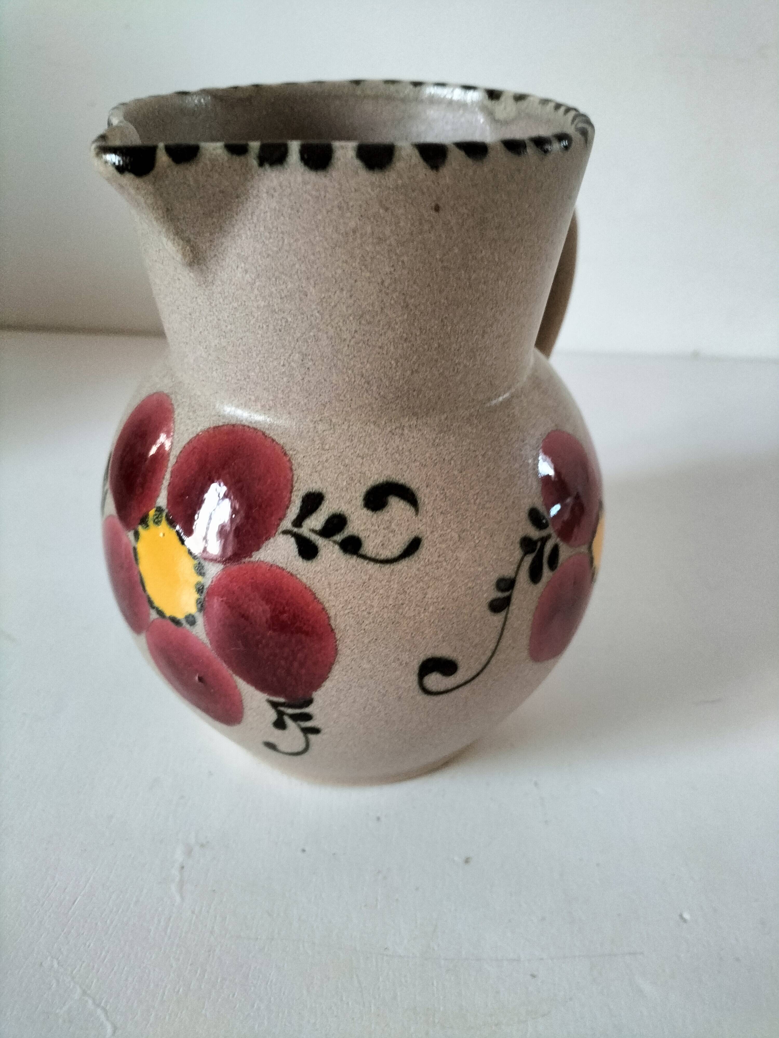 Vintage stoneware pitcher with hand-painted floral decoration, 1960s–70s