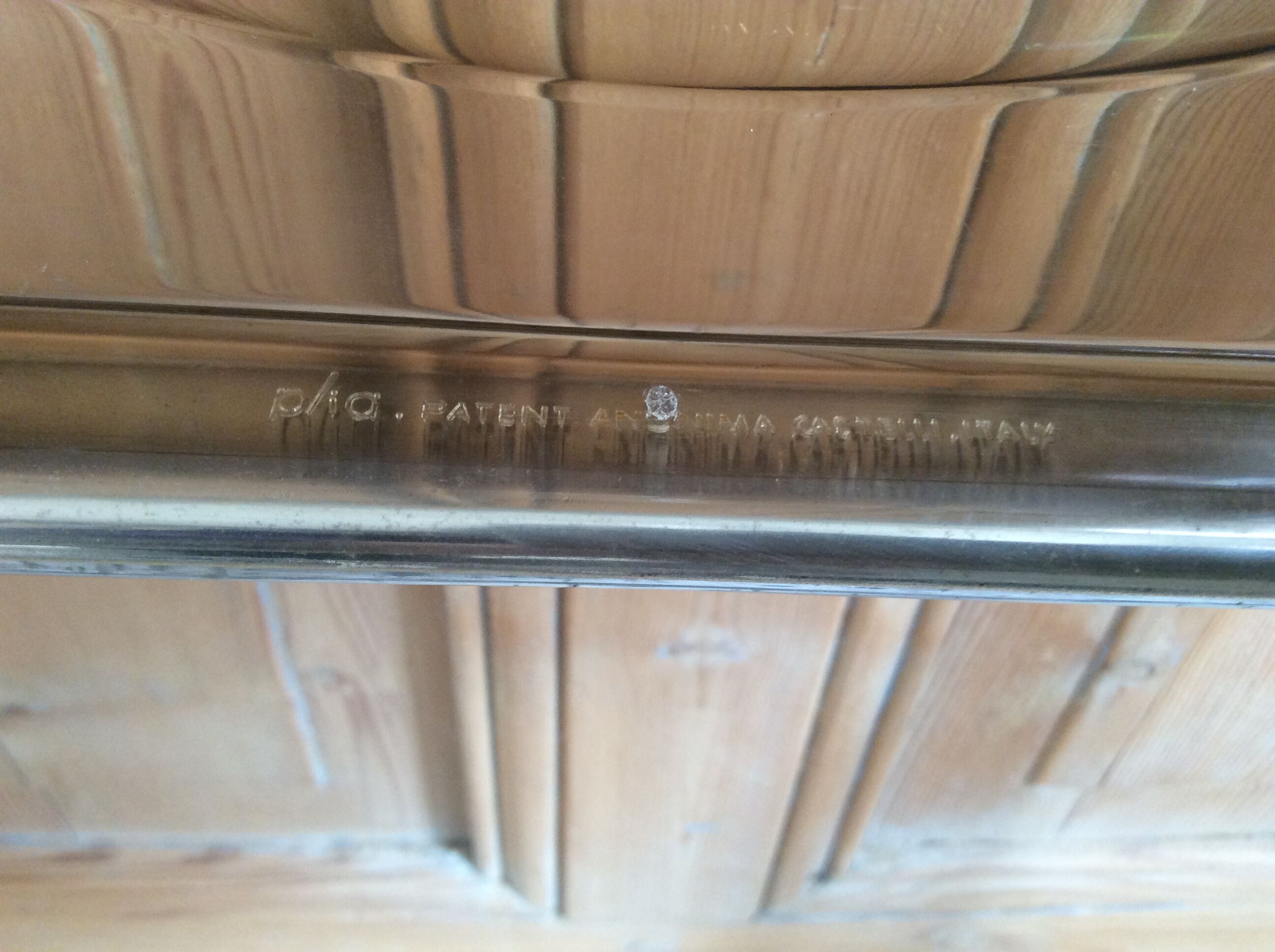 Folded chair by Giancardo Piretti for Castelli