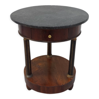Empire style saddle-style pedestal table in mahogany
