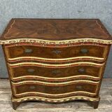 Louis XV style curved chest of drawers in rosewood and rosewood marquetry