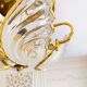 Plafonnier vintage Art Déco en laiton massif et cristal – années 70