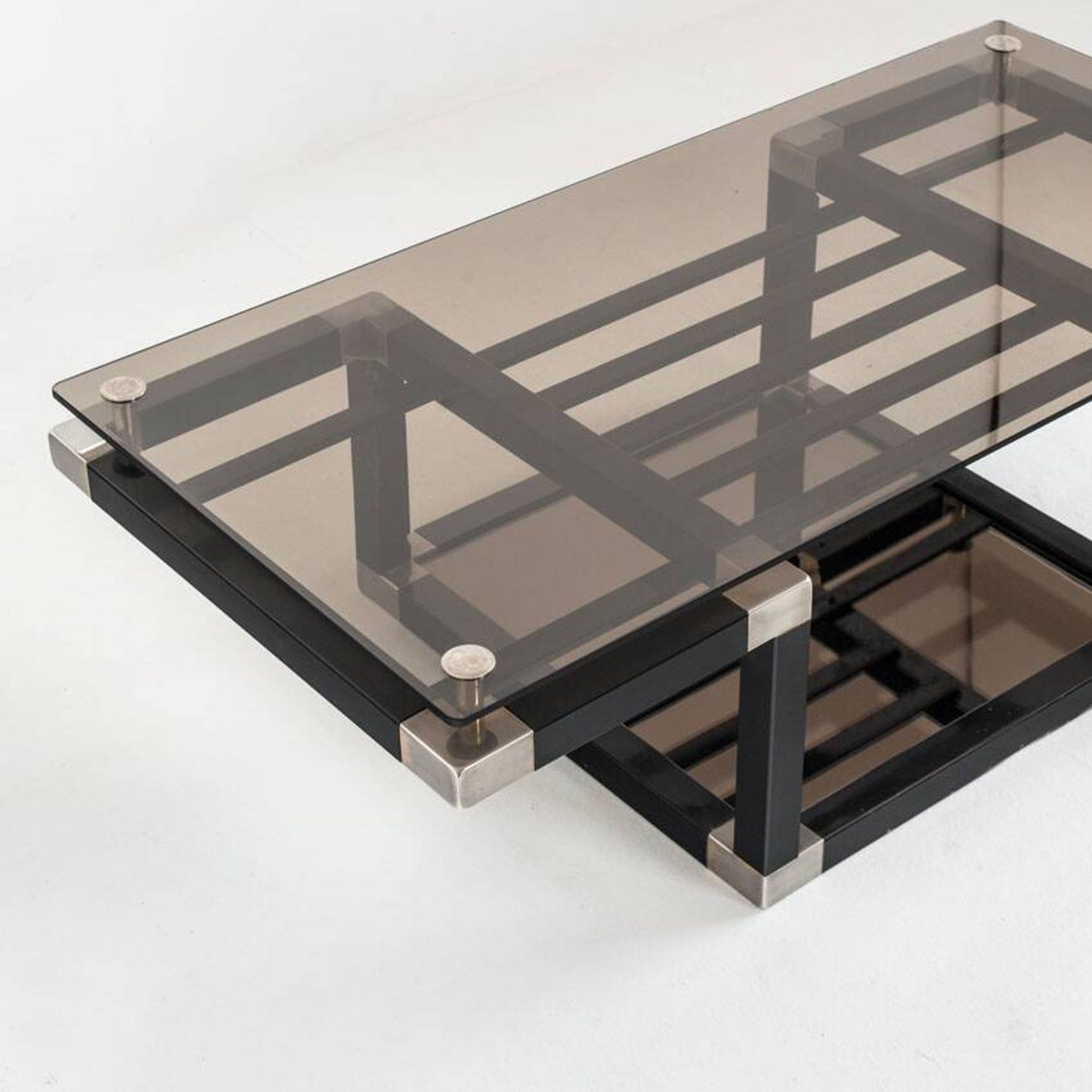 Coffee table attributed to Romeo Rega. Iron and smoked glass – France, 1980s.