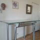 High table with tempered glass and chrome base.