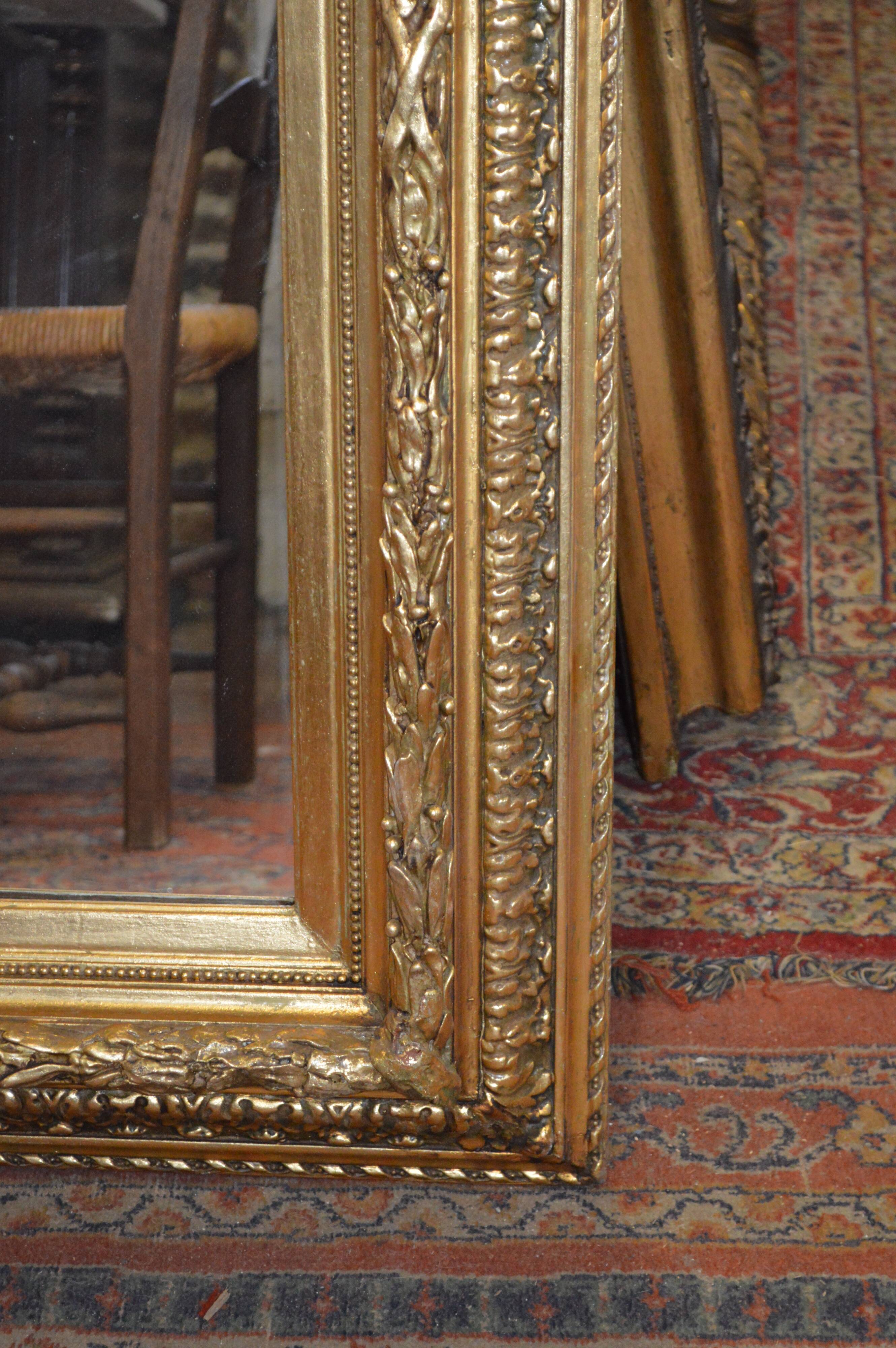 Moulded gold mirror
