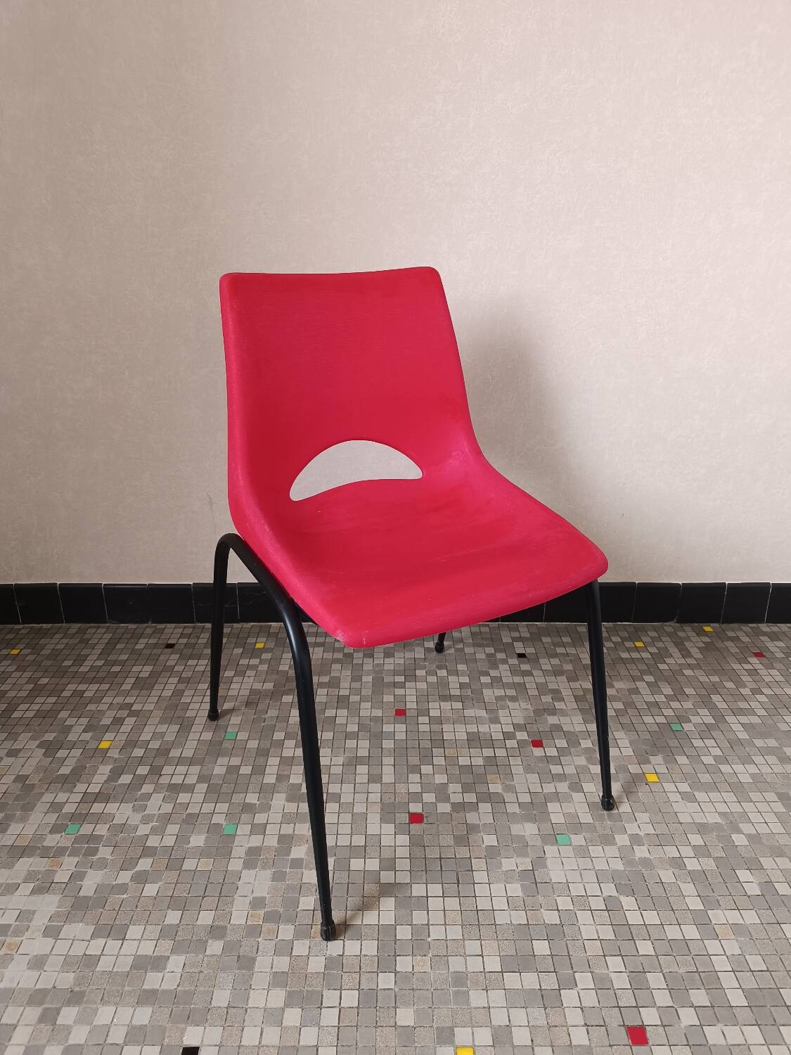 Vintage red plastic shell chair