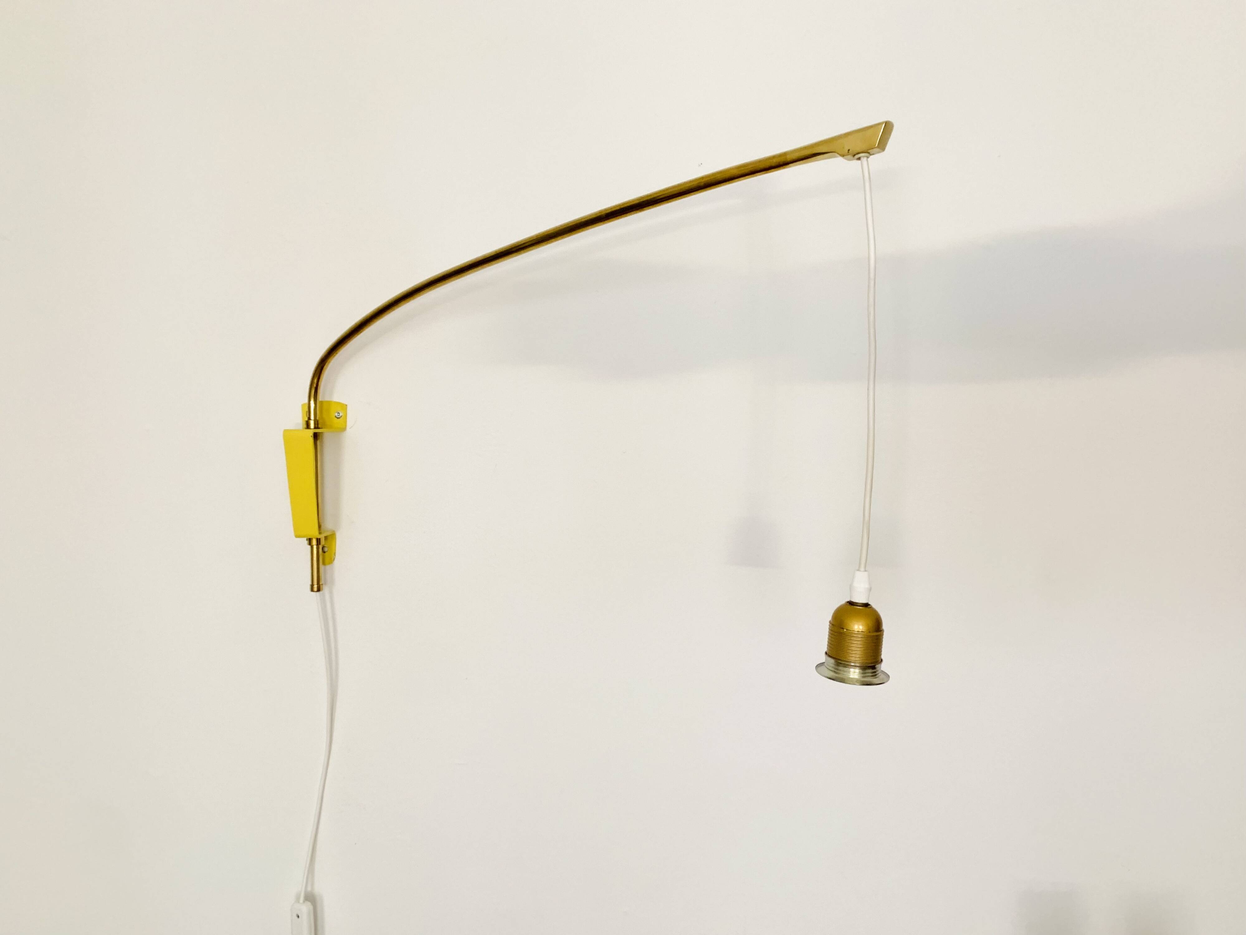 Adjustable Brass and Wicker Arc Sconce