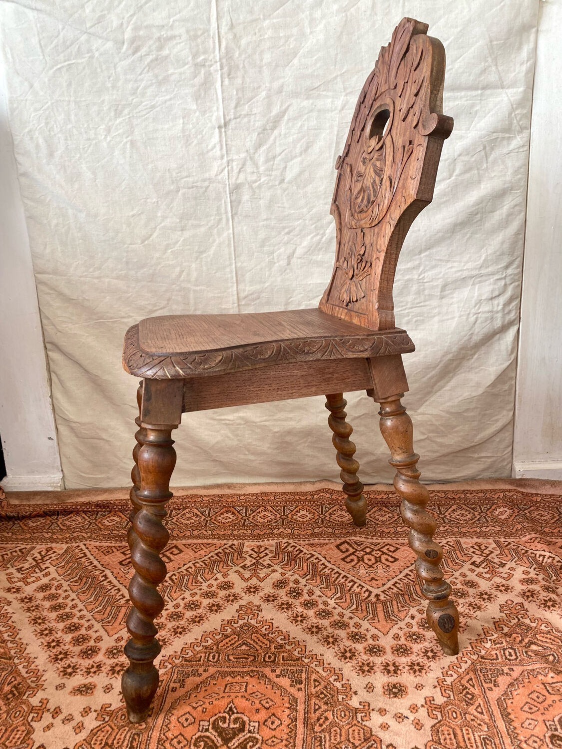 Antique Alsatian chair in carved wood