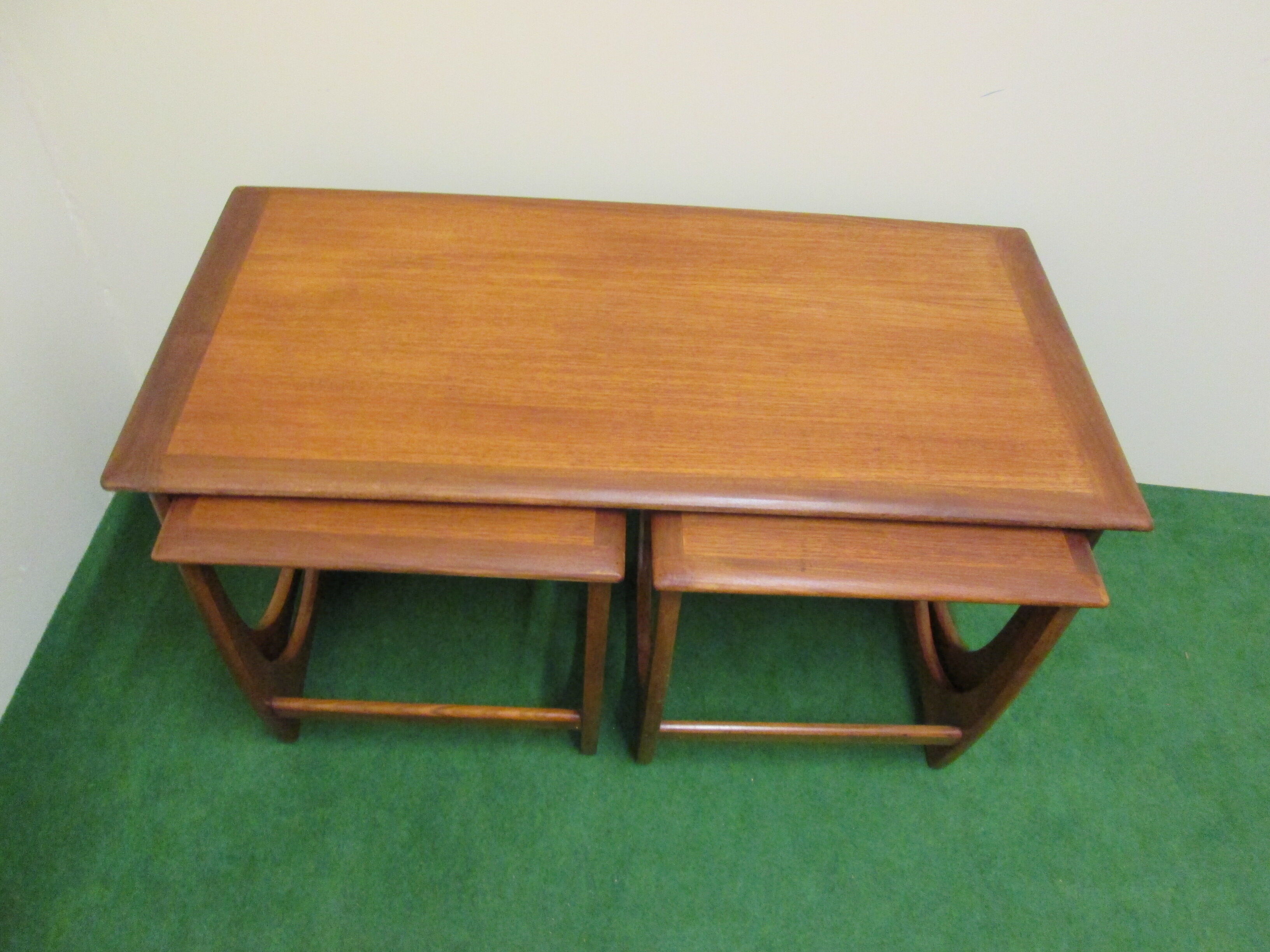 Nesting coffee tables in teak