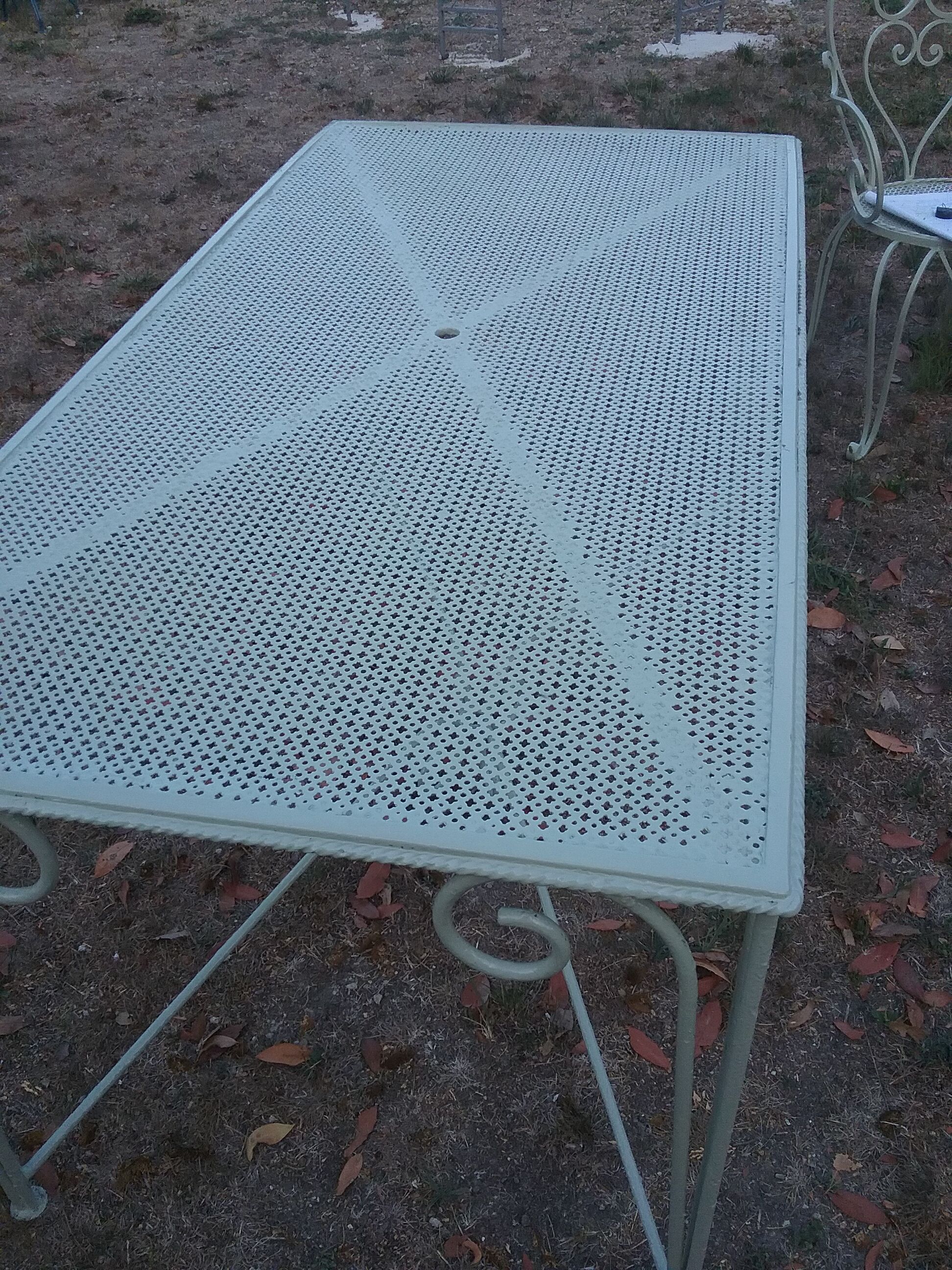 Garden furniture in green wrought iron